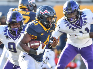 Doege throws 2 TDs, West Virginia runs over TCU 24-6
